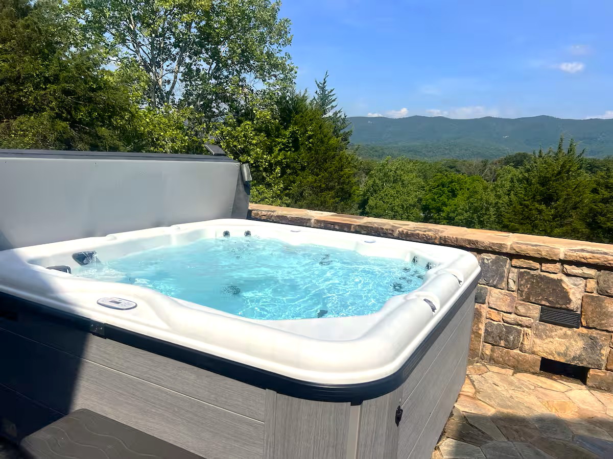 Relax, soak, and take in panoramic mountain views from the hot tub