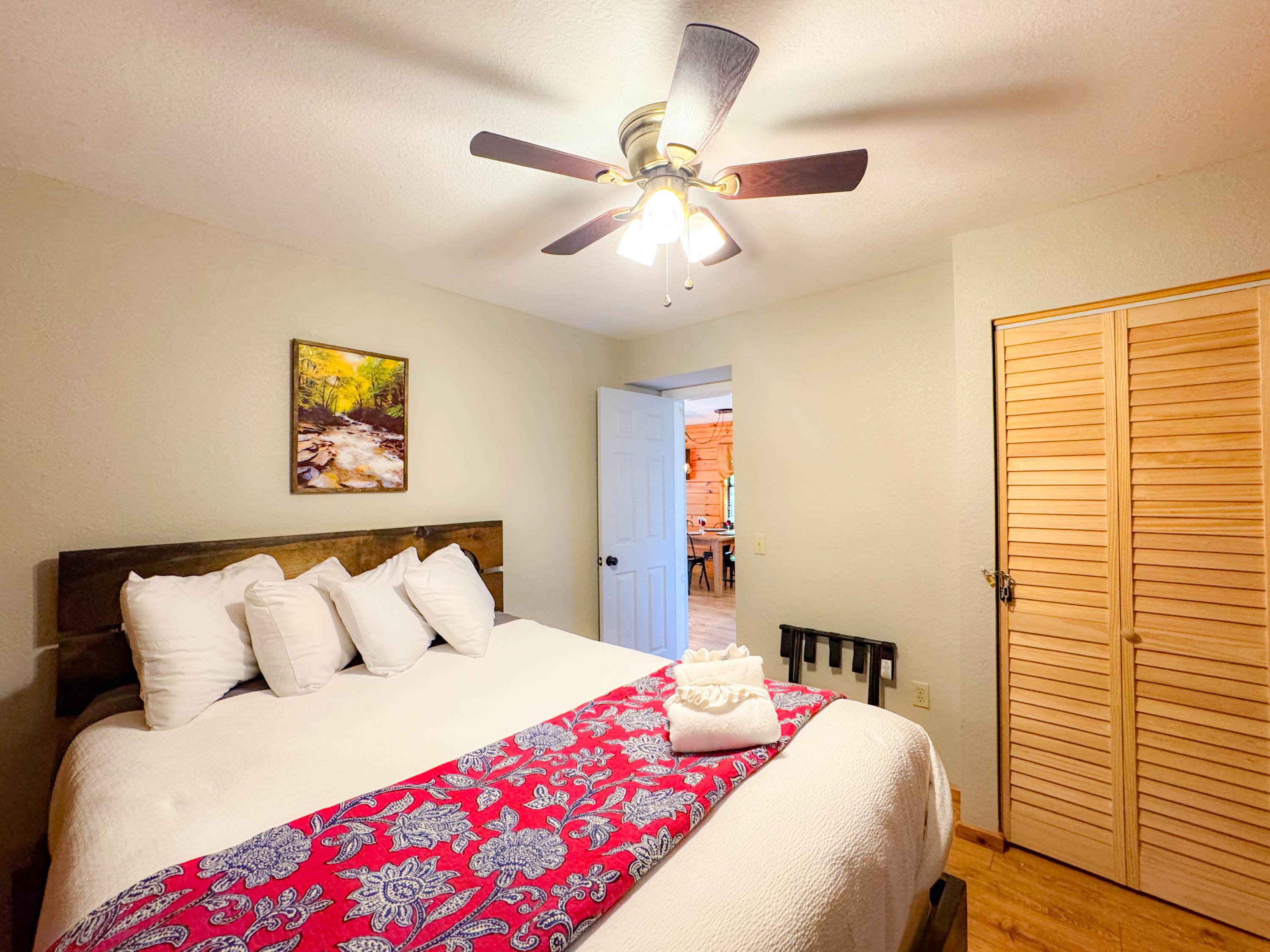 the main level bedroom features a hybrid memory foam queen bed