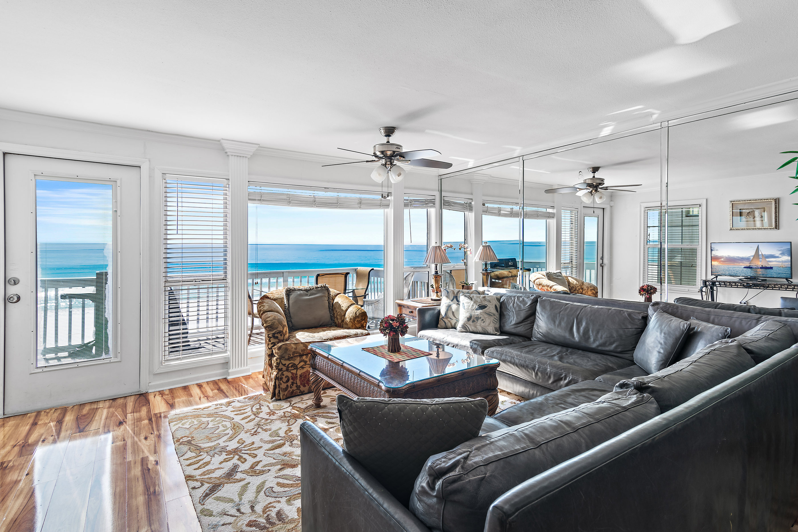 GULF VIEW LIVING SPACE - Open concept living space on the 2nd Floor features Gulf Views, a Large, Comfortable Leather Sectional around a 65" Smart TV