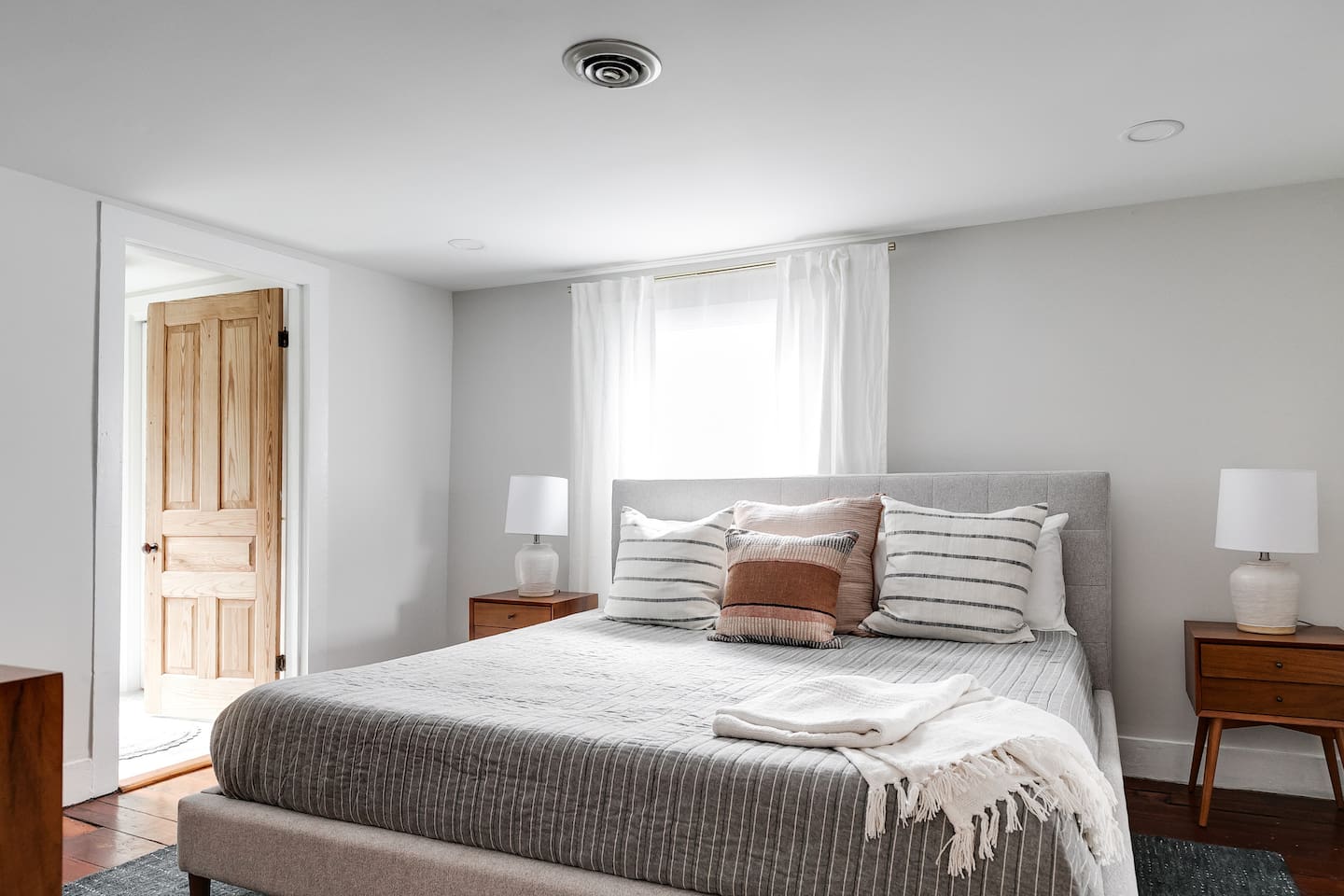 2nd Floor King Bedroom: Bright and airy with a king bed, stylish decor, and modern amenities awaits you!