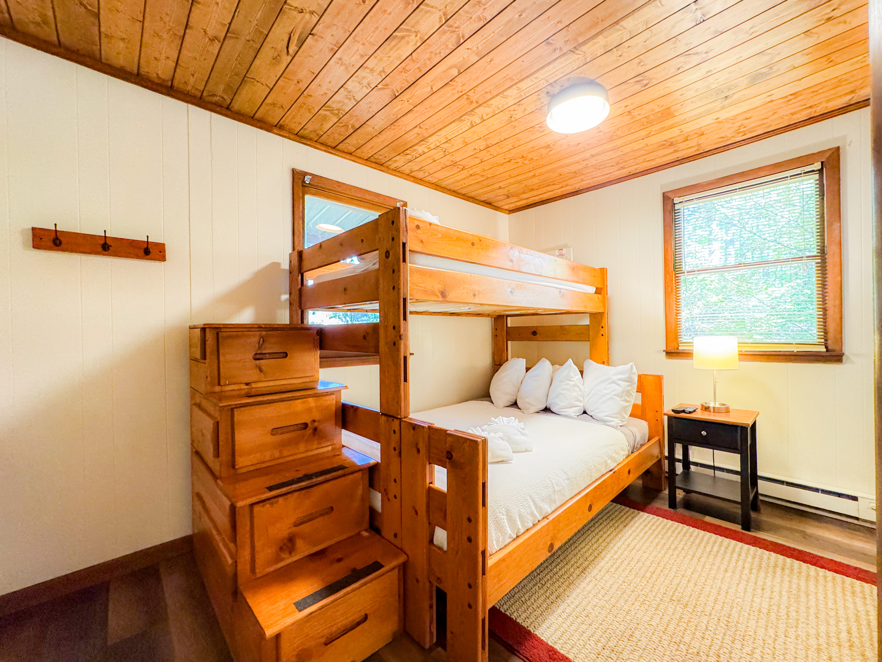 The second bedroom on the main level features a twin over full bunk bed. Roku TV's are in all bedrooms.