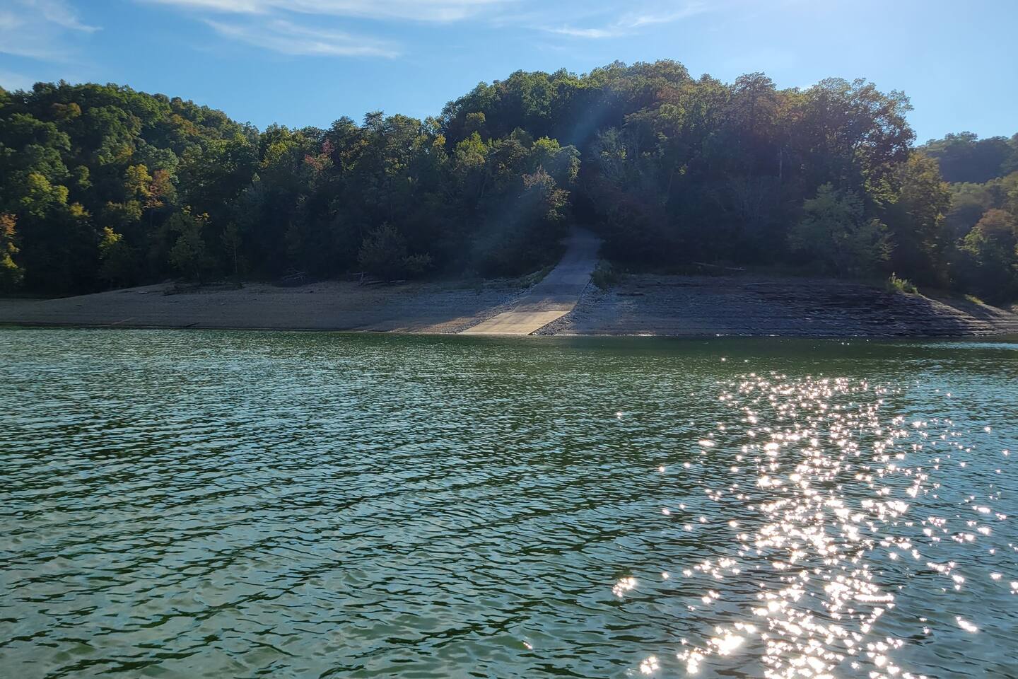 Enjoy direct access to the water from the boat ramp and shoreline—perfect for launching your boat, kayaking, or relaxing by the lake.