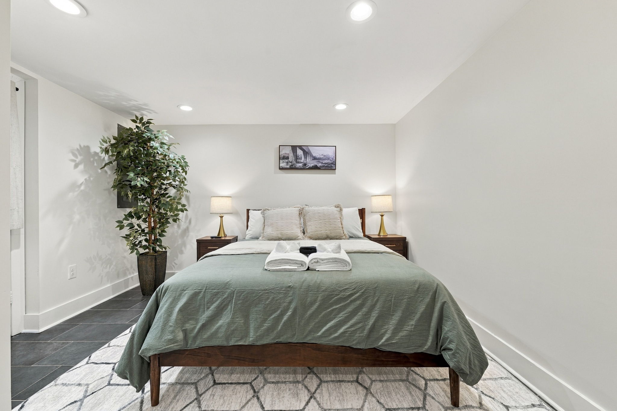 Bedroom Bliss: Relax in serene surroundings with plush bedding and soft lighting!