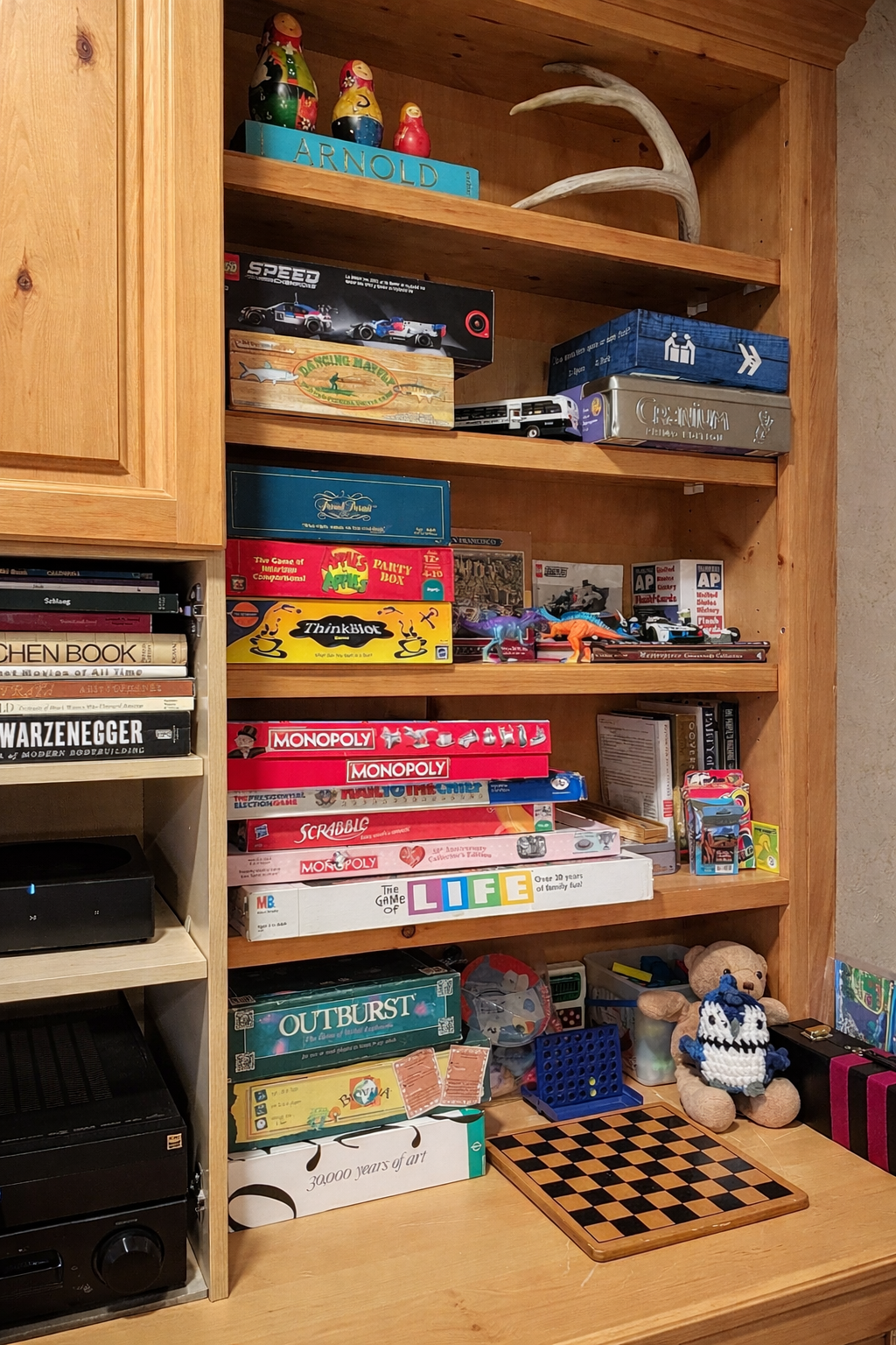 A full shelf of classic boardgames