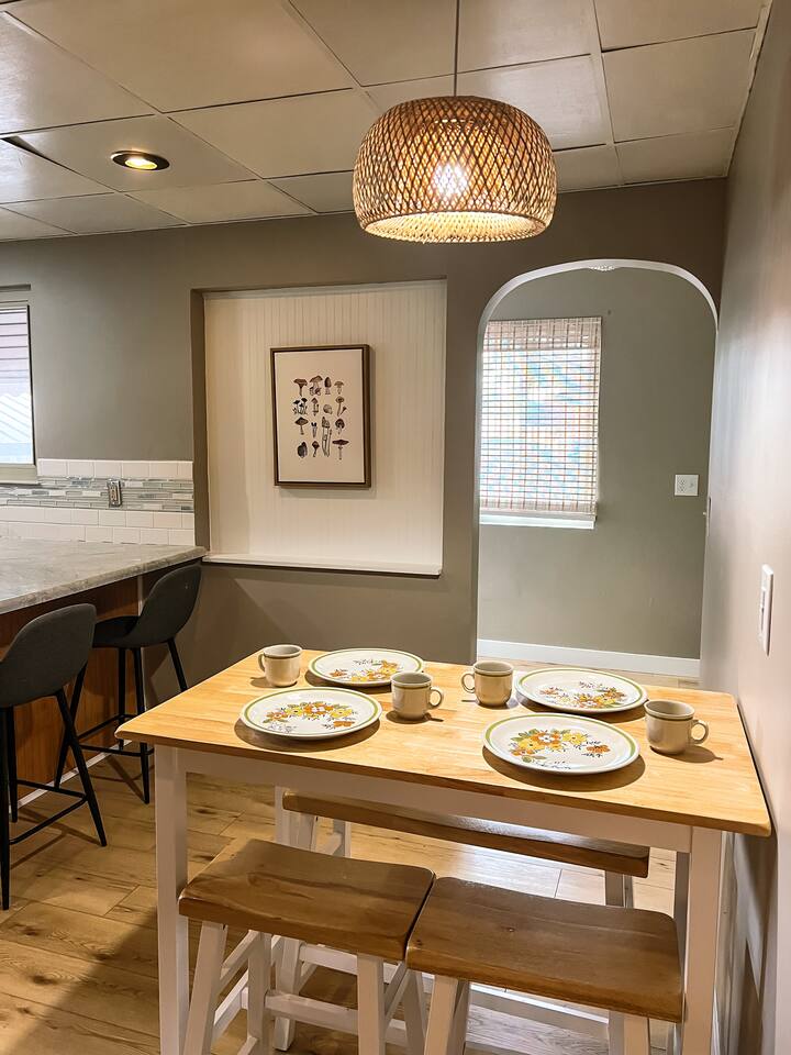 Dining table seats four and an additional two can sit at the counter.