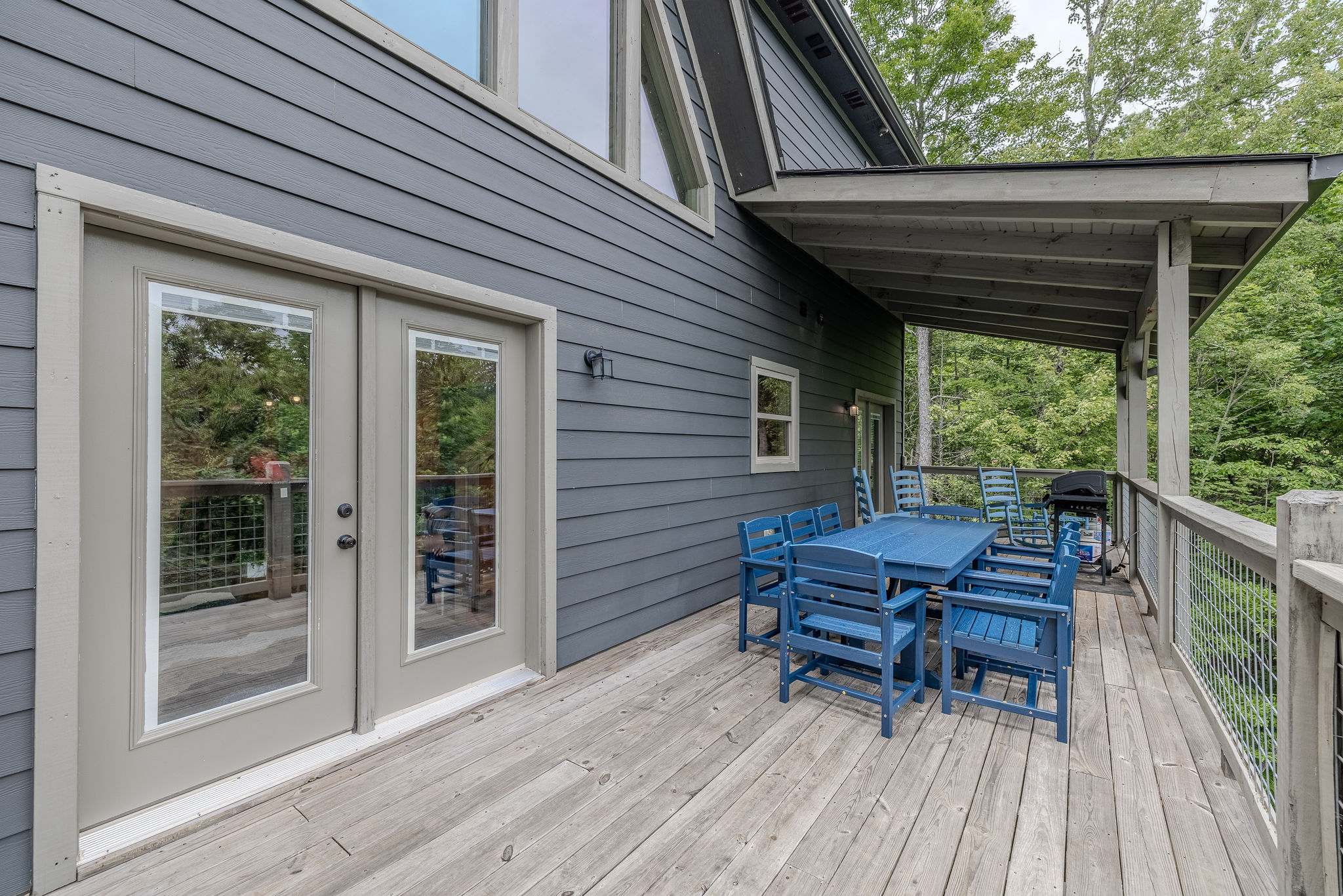 The deck gives guests a place to sip coffee, grill, or unwind in the fresh mountain air.