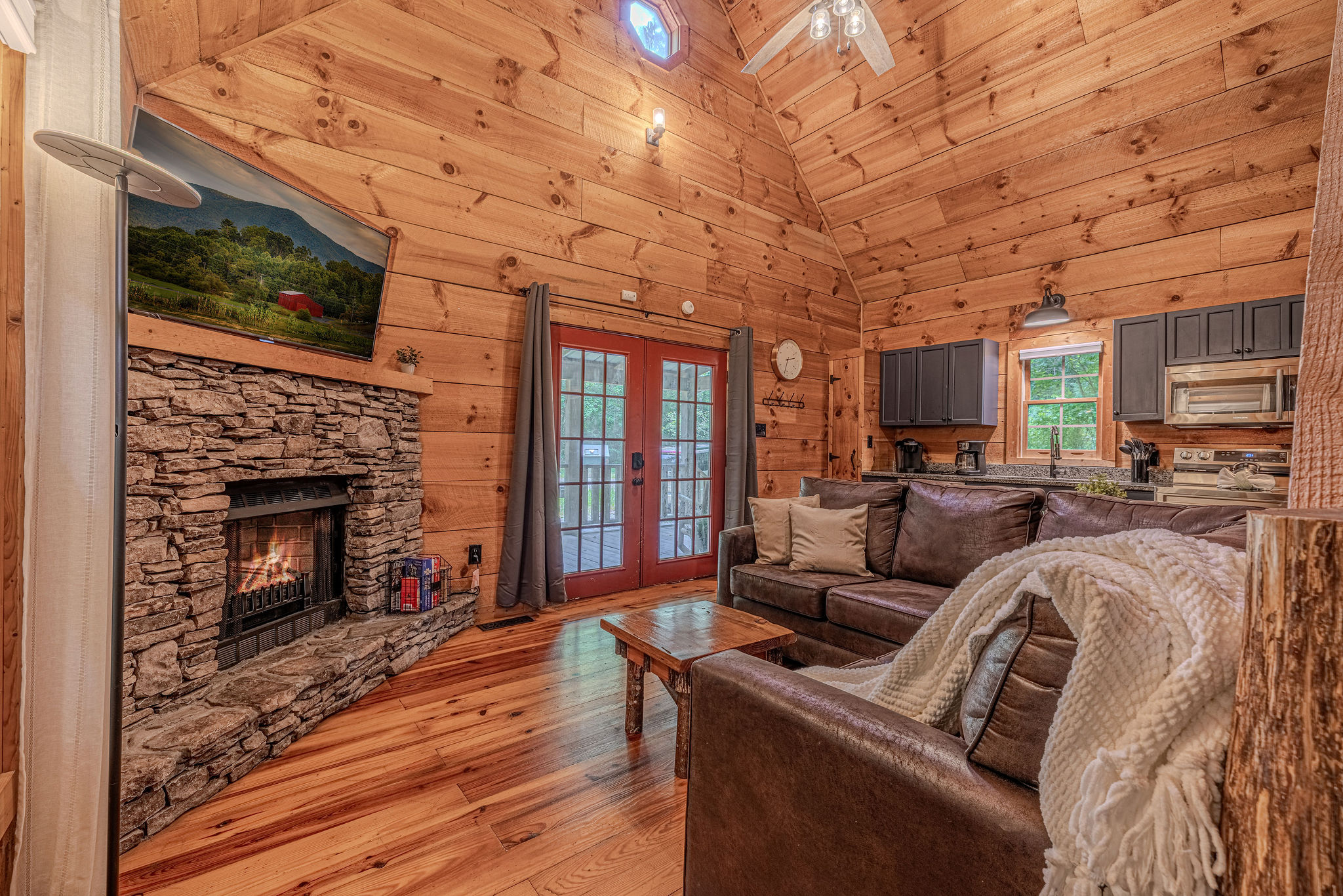 Stone fireplace, wood floors, good place to just sit.