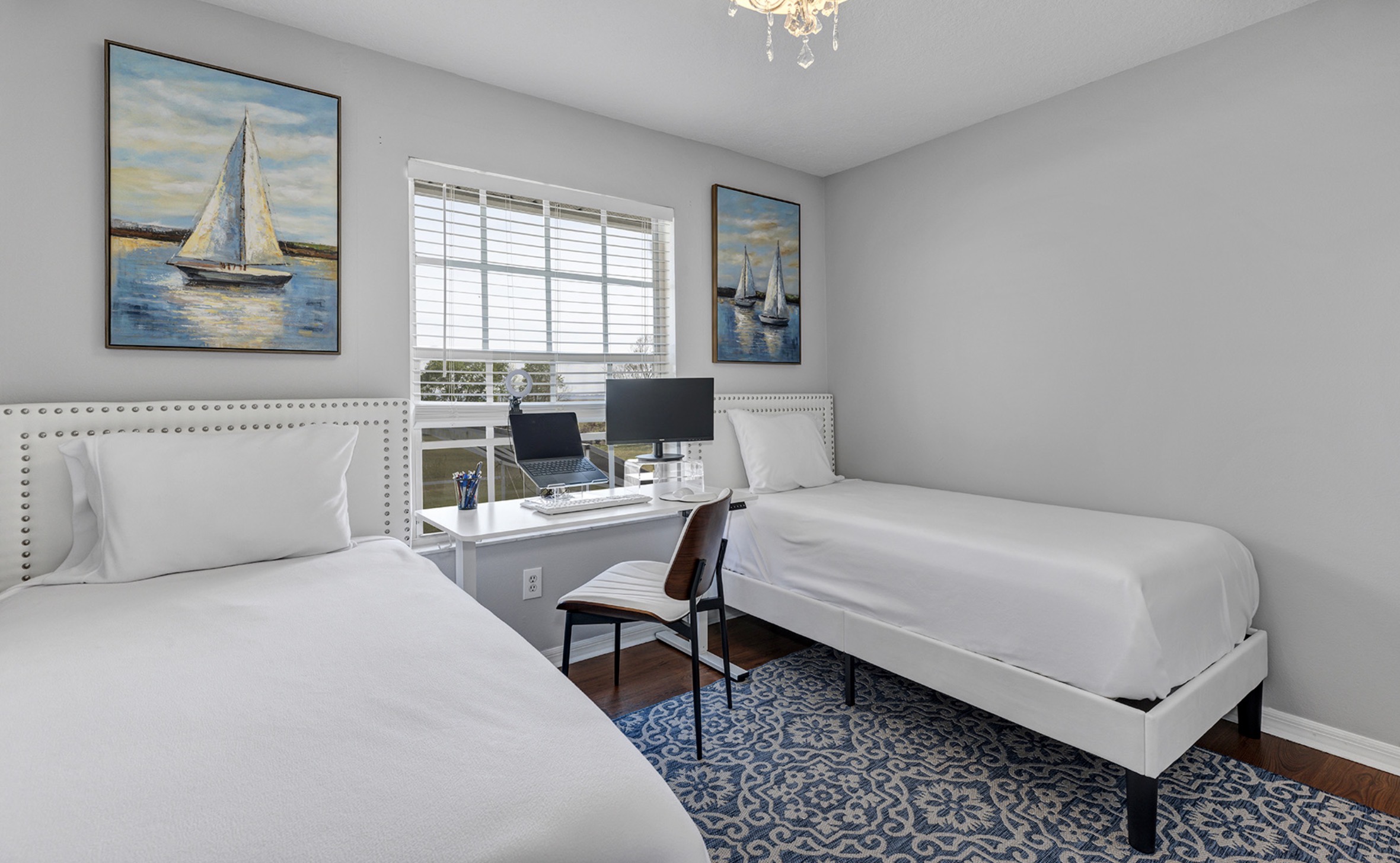 Two twin beds with work station. Office printer also available.