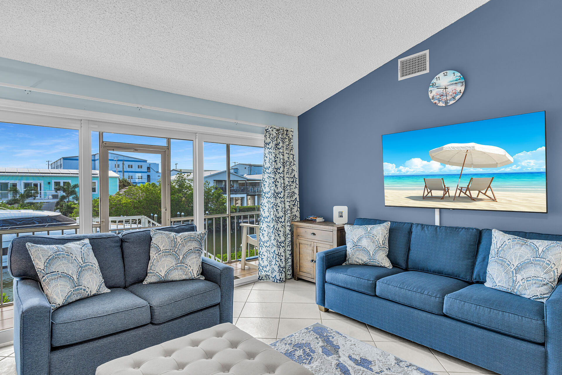 Sleeper sofa in living room overlooking the waterway