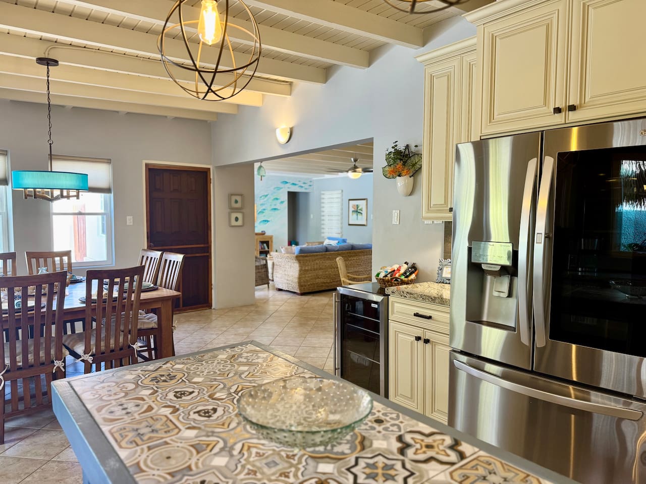 Full Sized Kitchen with full sized refrigerator and wine refrigerator.