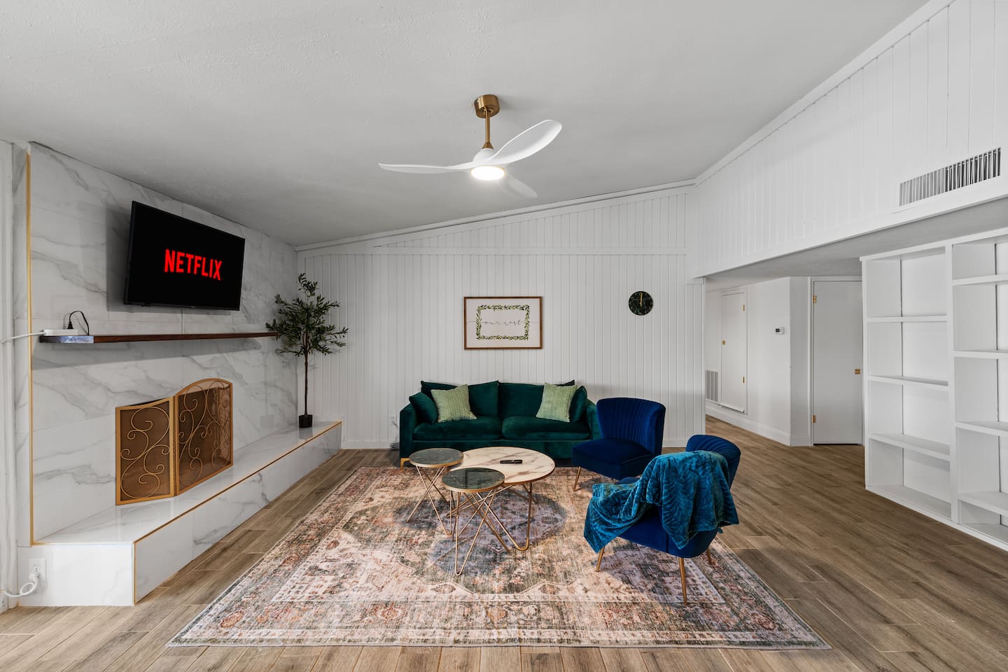 Expansive living space with cozy fireplace, smart TV, and room for everyone to spread out.