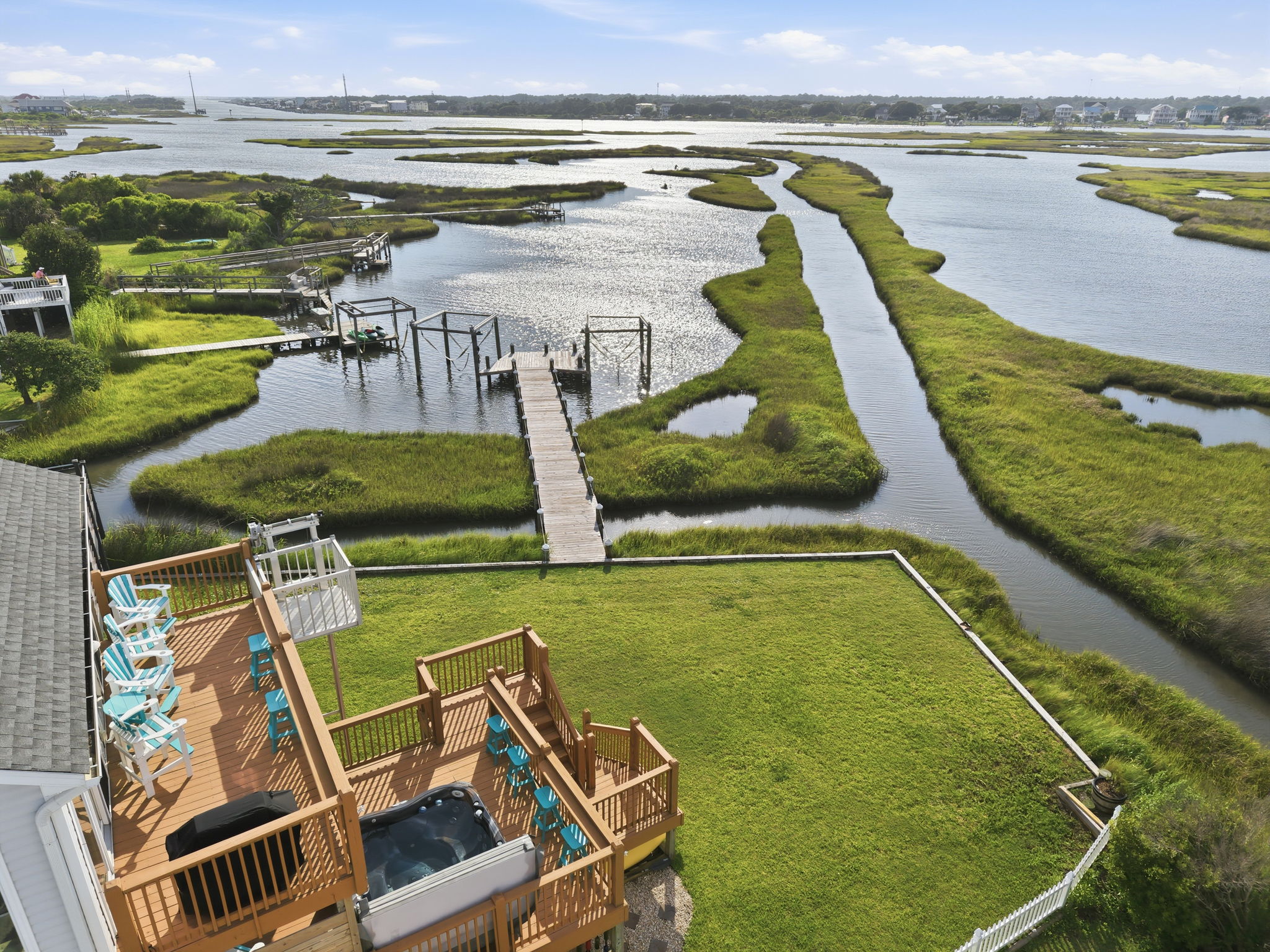 The back deck is the perfect spot to enjoy the sights, sounds, and serenity of the water. 