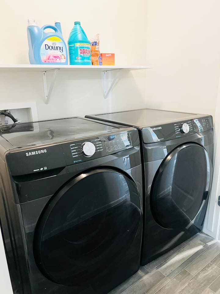 Steam washer and dryer, with laundry pods available. 