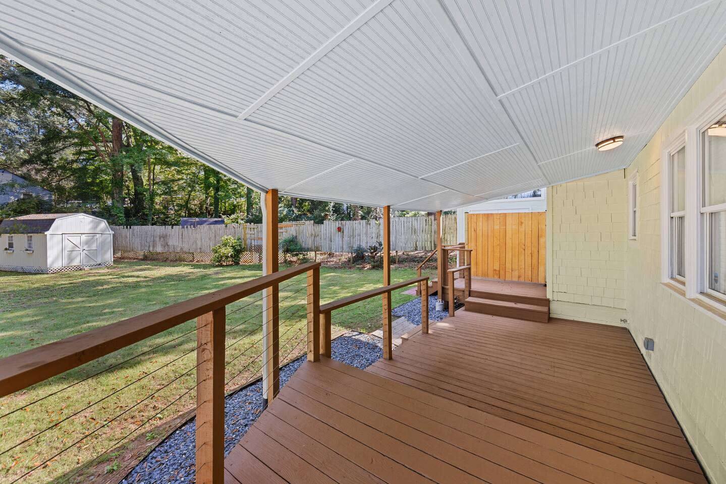 Outdoor furniture has been added since this picture was taken.  There is seating for 4; a loveseat, two outdoor armchairs and a coffee table.  It's a relaxing setting for either day or night.