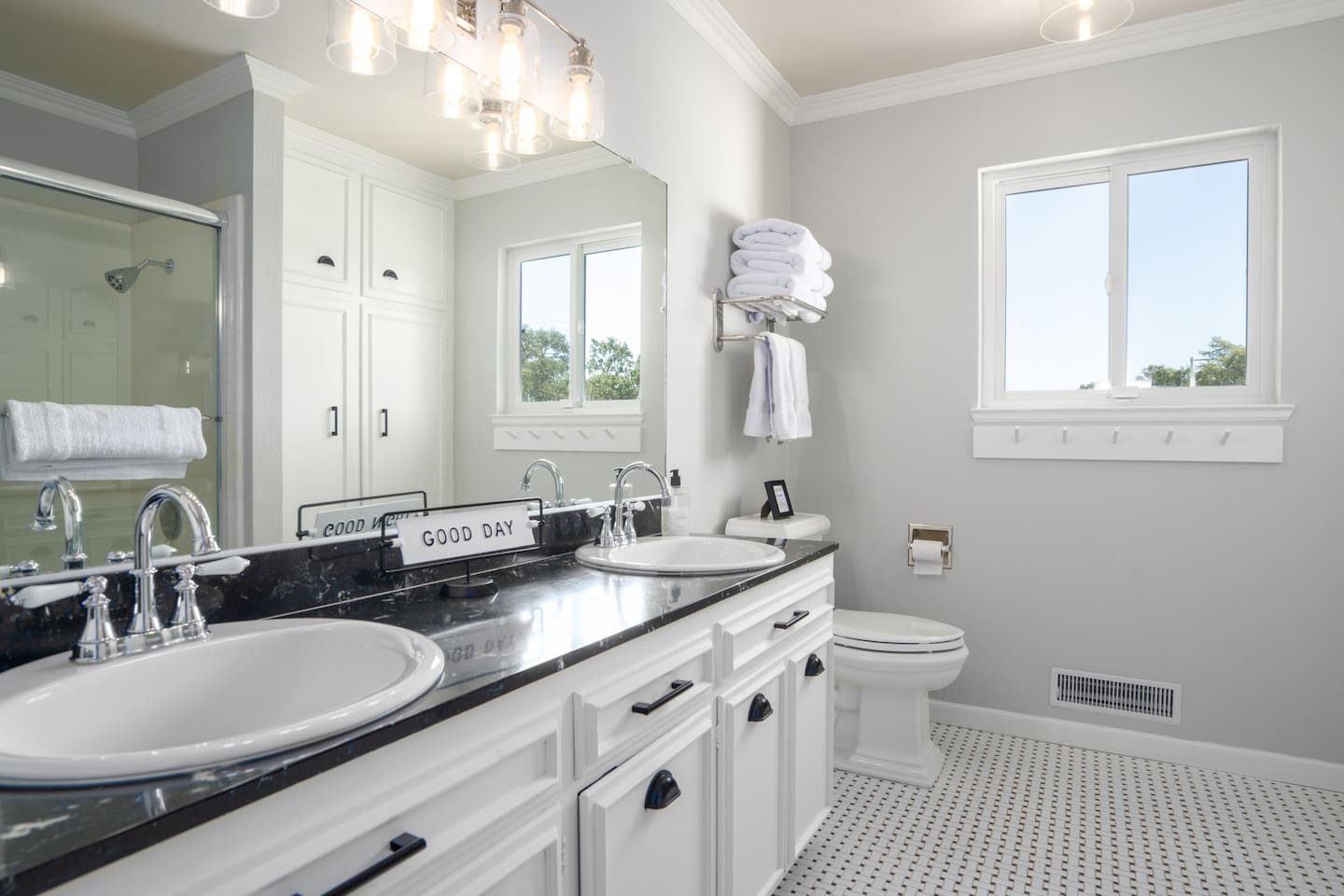 Enjoy the convenience of a shared bathroom with dual sinks.