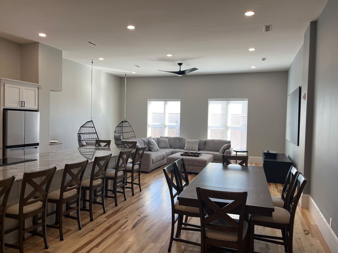You can easily see our intention to turn this space into a virtual pace to entertain with the wide open space, 12’ ceilings and 8’ tall doors.  The dining room table seats 6 comfortably and the 14’ island offers seating for an additional 8!