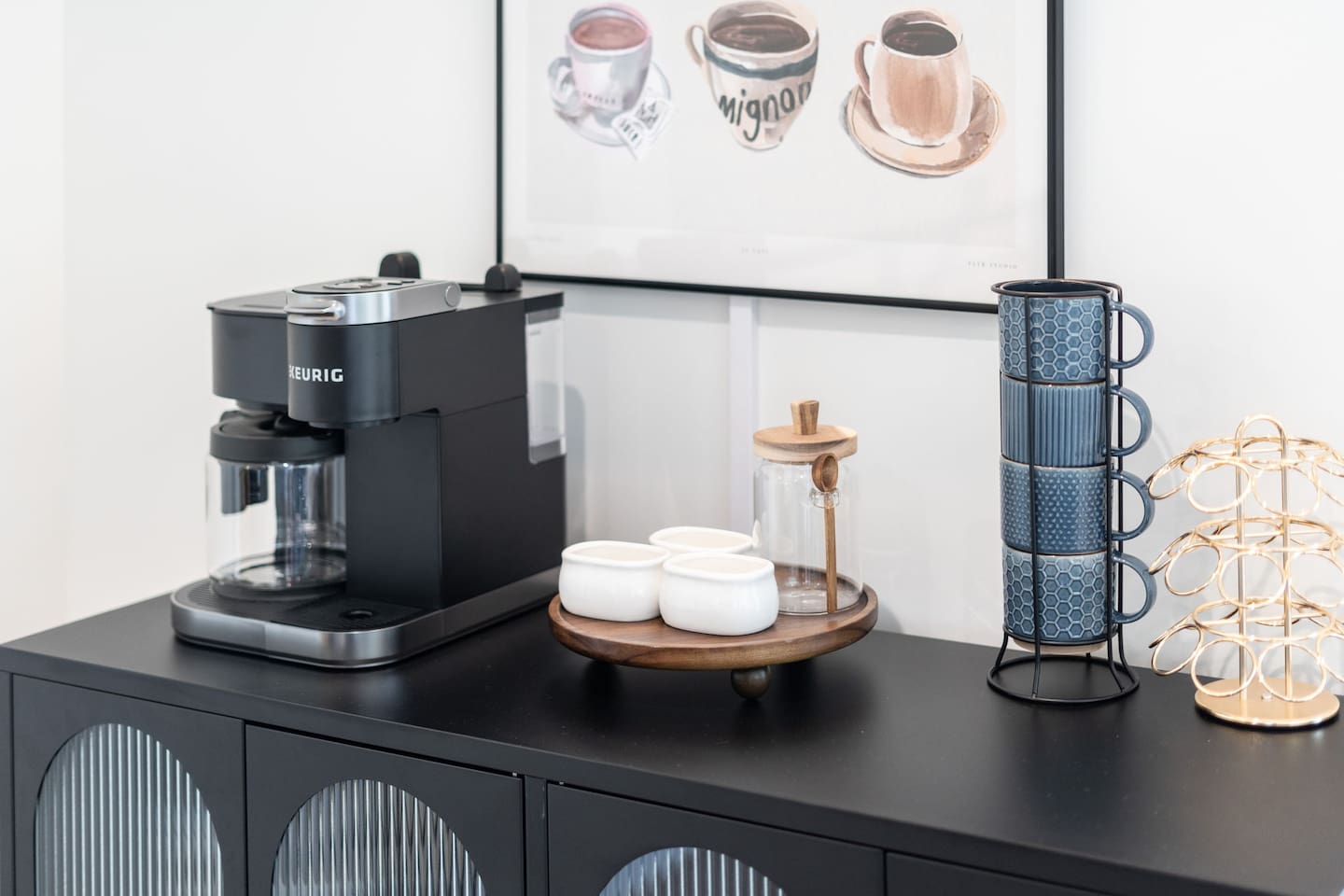 Coffee essentials and chic mugs displayed with care.