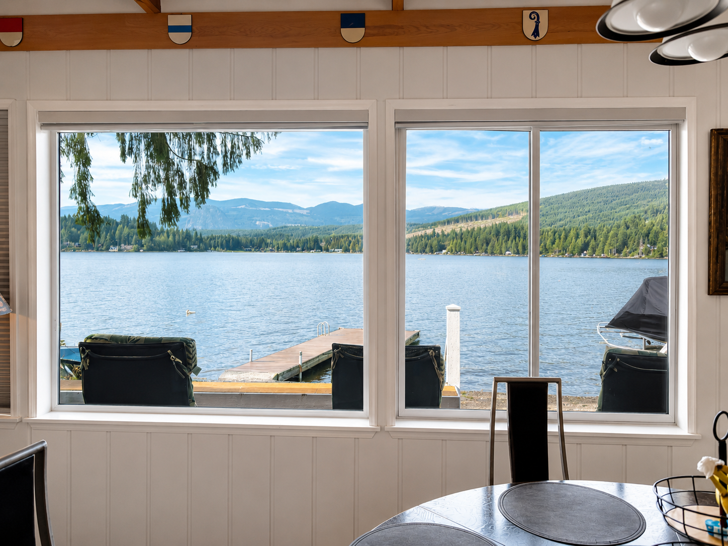 The living space windows frame beautiful lake and mountain views, bringing the peaceful beauty of Lake Cavanaugh right into the room.