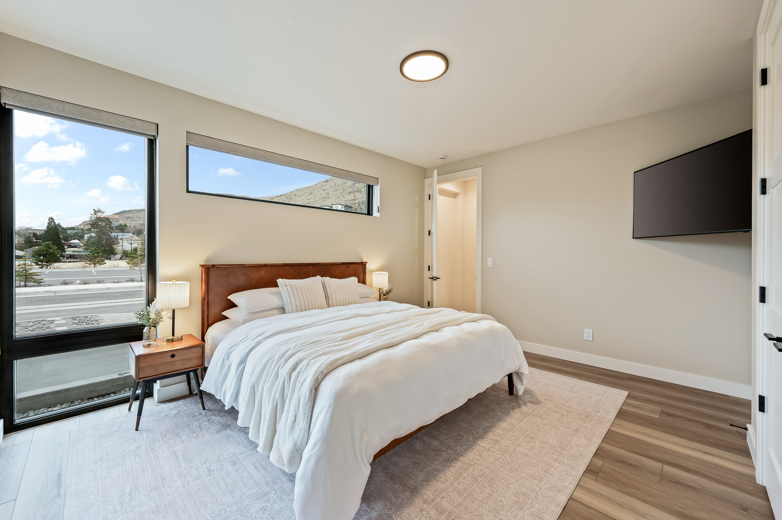 Bedroom #1 of 7 - Main floor, king bed, Smart TV, en suite with walk-in shower