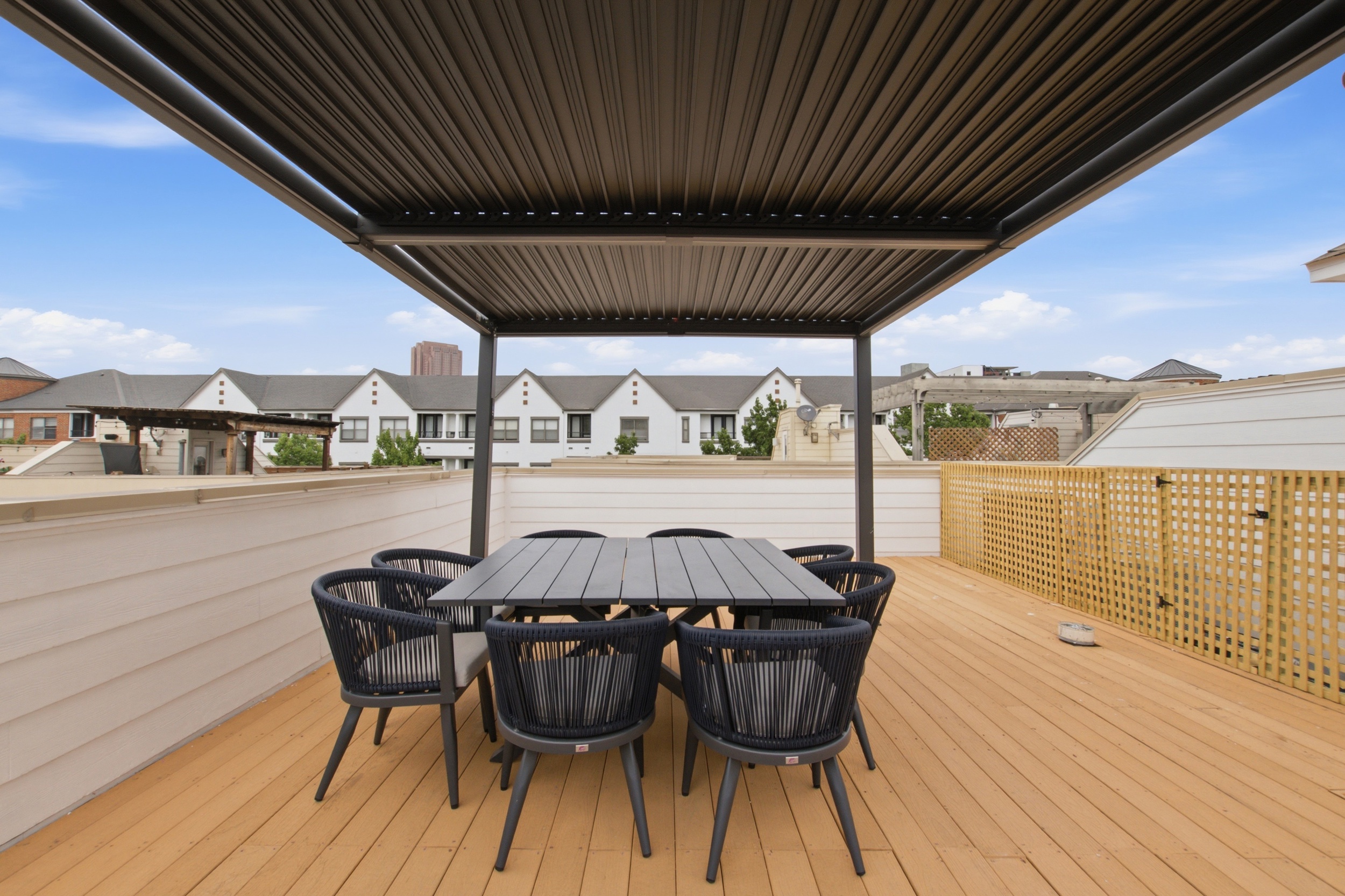 Dine al fresco with stunning views under a stylish covered patio!