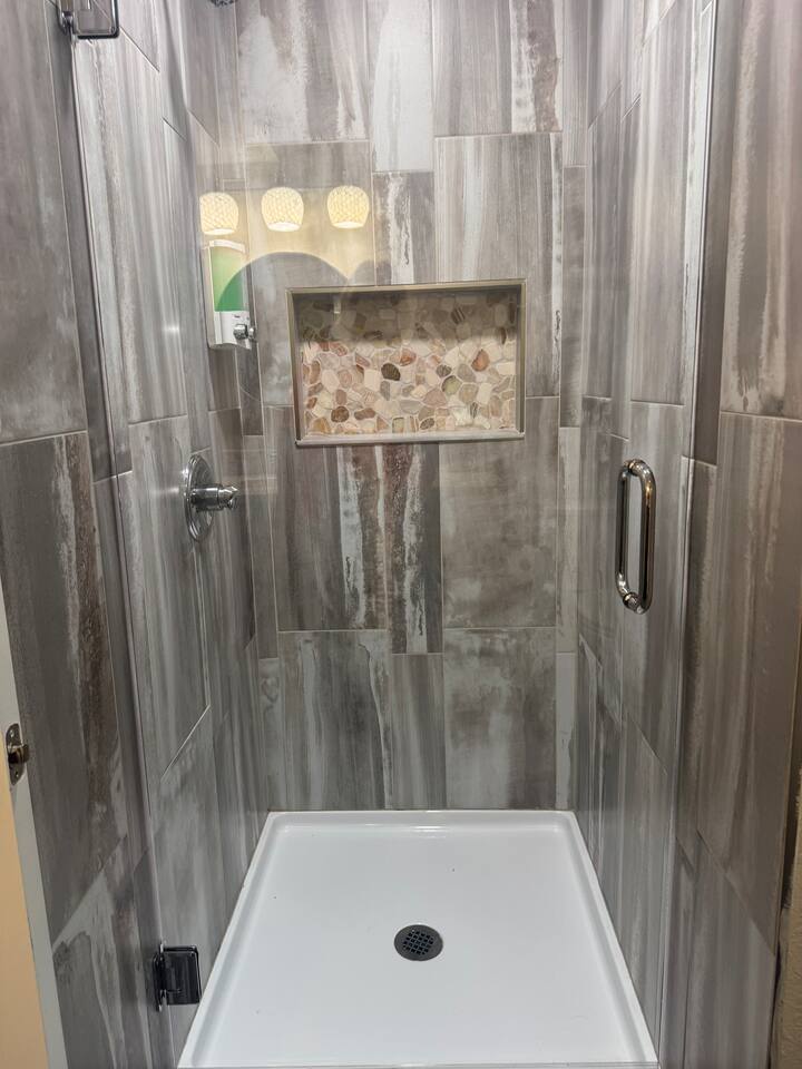Lower level walk-in shower