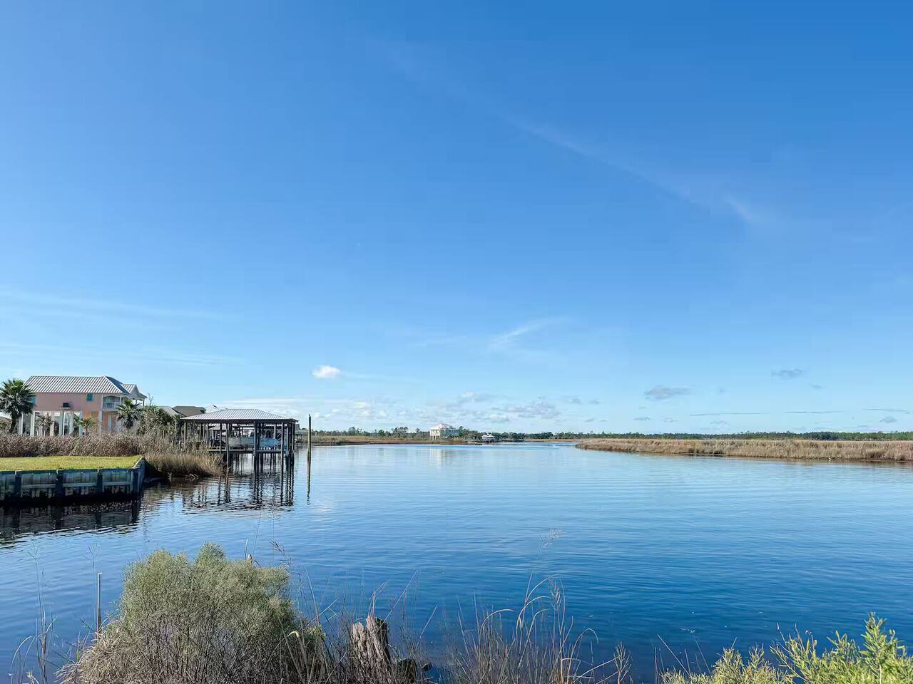 Beautiful waterway surrounded by natural marshland, offering peaceful views and a true coastal retreat feel.