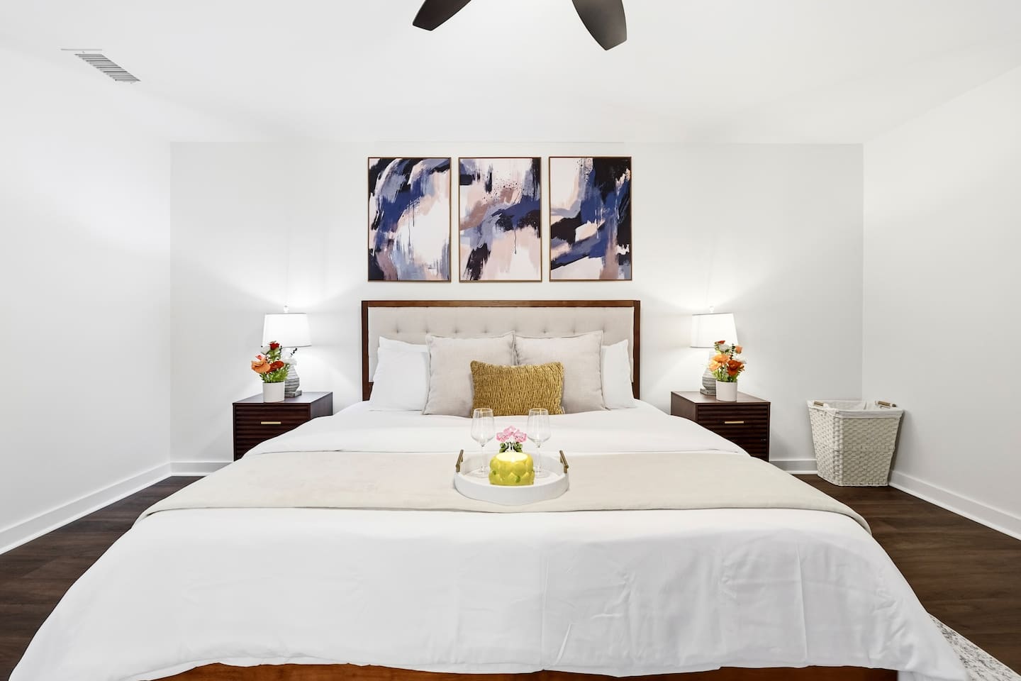 Cozy second-level bedroom featuring a king bed, a Roku-powered Smart TV, and located at the end of the hallway to the left at the top of the staircase. This room includes 2 full-body towels, 2 washcloths, and 2 hand towels for your stay.