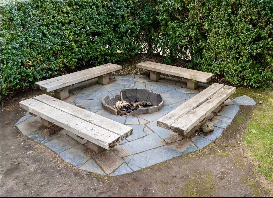 End the day around the community fire pit,  just steps away from the home, perfect for evening conversations and s'mores.