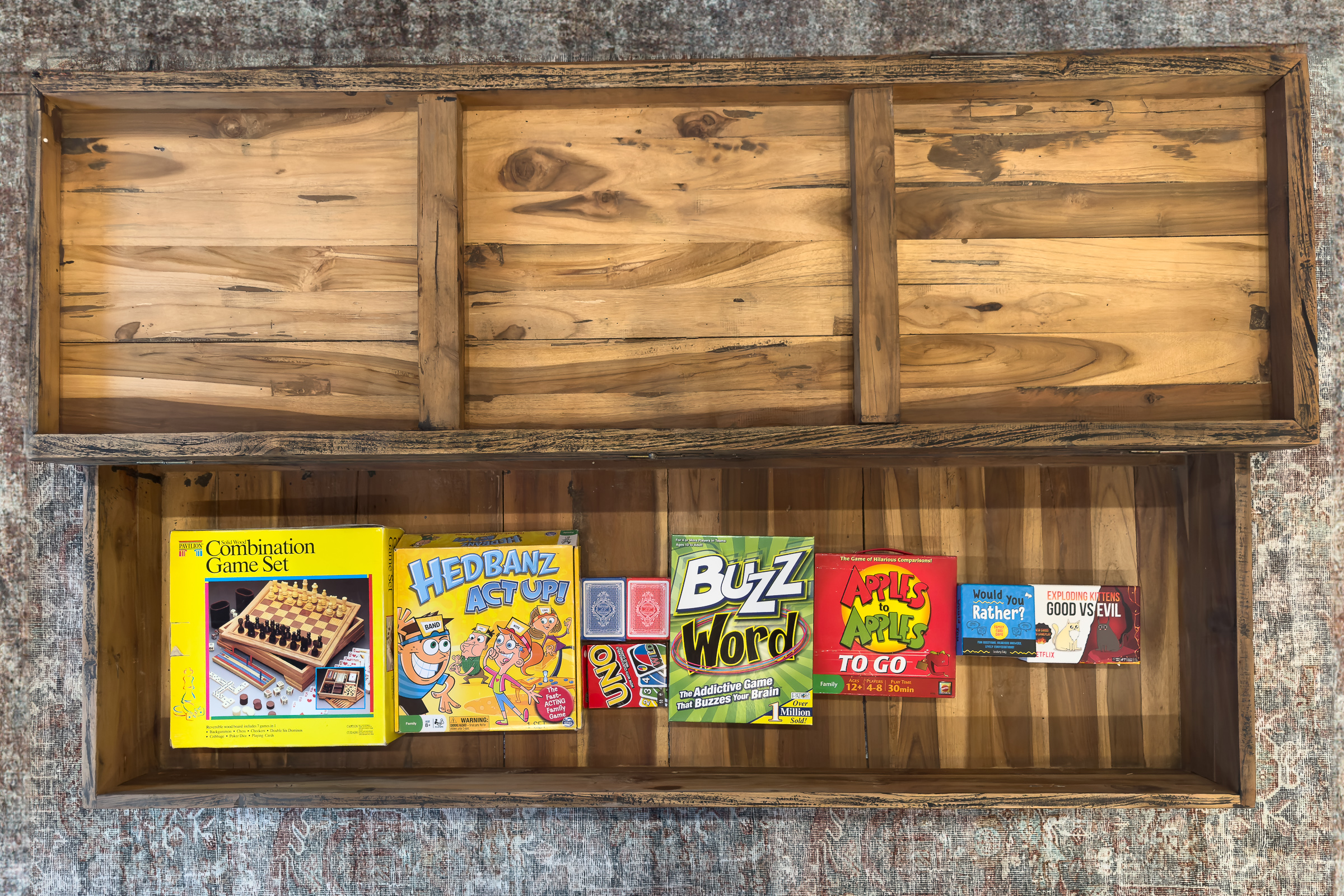 A peek inside the living room game drawer, fully stocked with family favorites for fun-filled nights together.