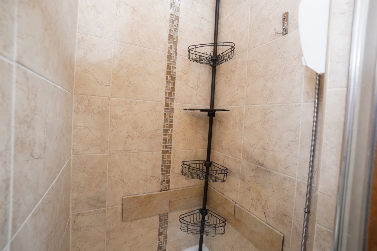 Enjoy a full-sized stand-up shower with exceptional water pressure