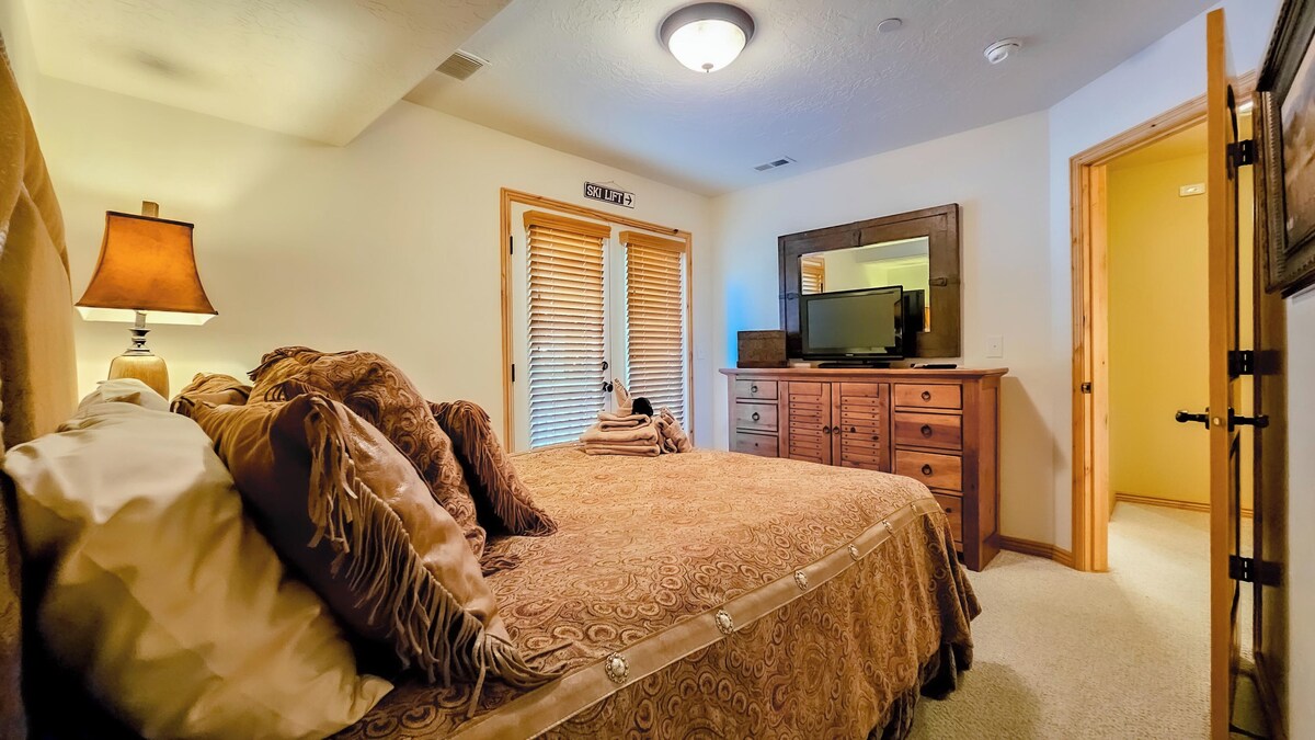 Unwind in bed as you stream your favorite shows on our smart TV!