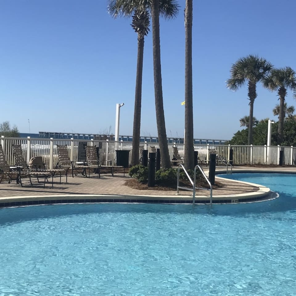 Large gulfside pool and second heated pool streetside.  Hot tubs on both sides