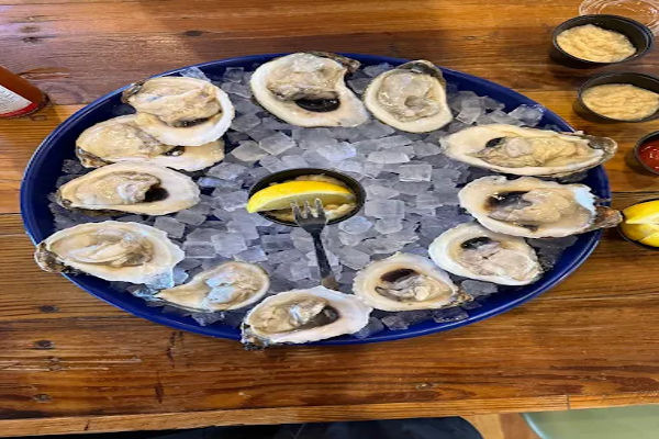 Shuck Me – Seafood & patio dining (8–9 min drive)