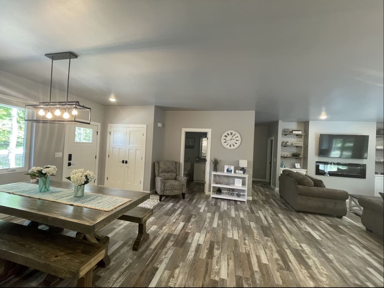 House #2 - Dining area, half bath, entry and living room