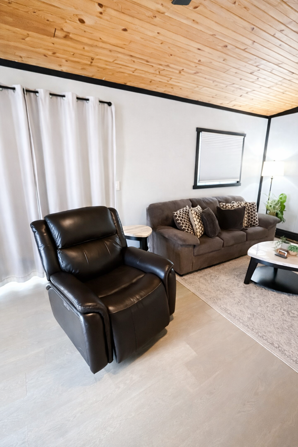 Sink into the plush sofa and indulge in the perfect blend of comfort and elegance