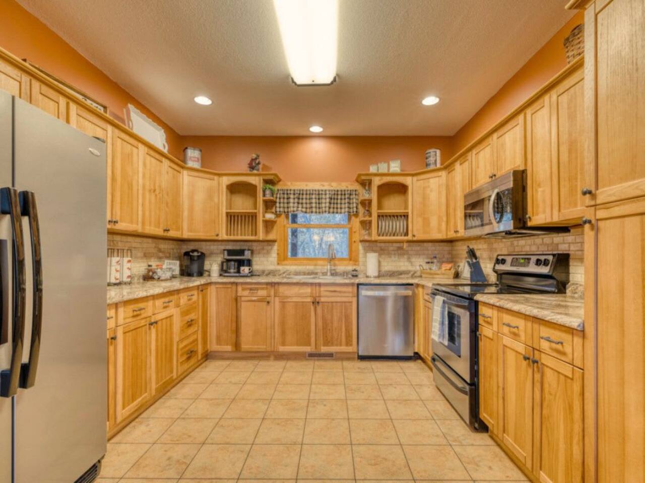 The kitchen area is fully equipped with all amenities.