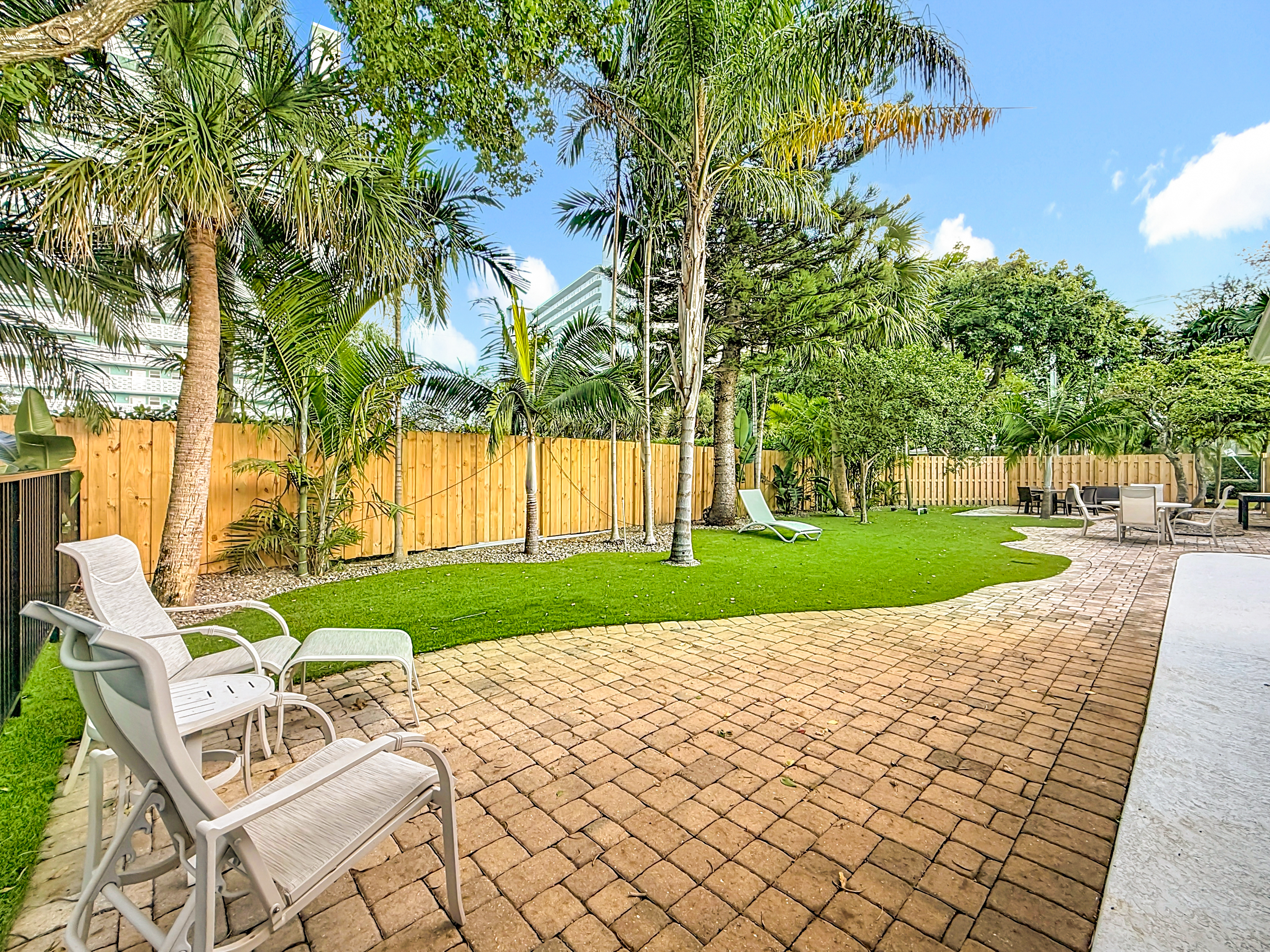 Large separately fenced in area that gives another big turf location. Good for playing or just hanging. 