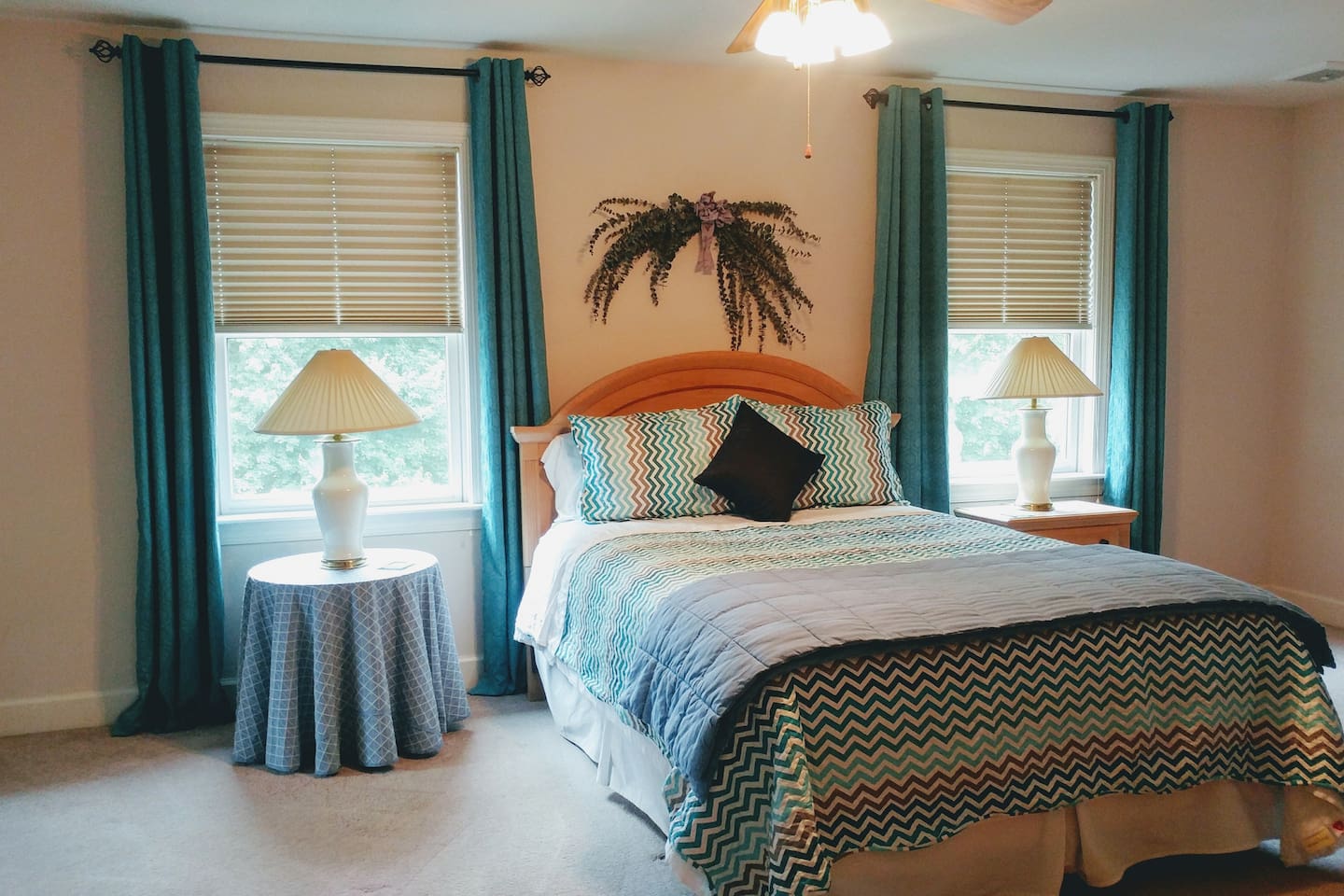 Upstairs master with queen bed and en-suite bath.