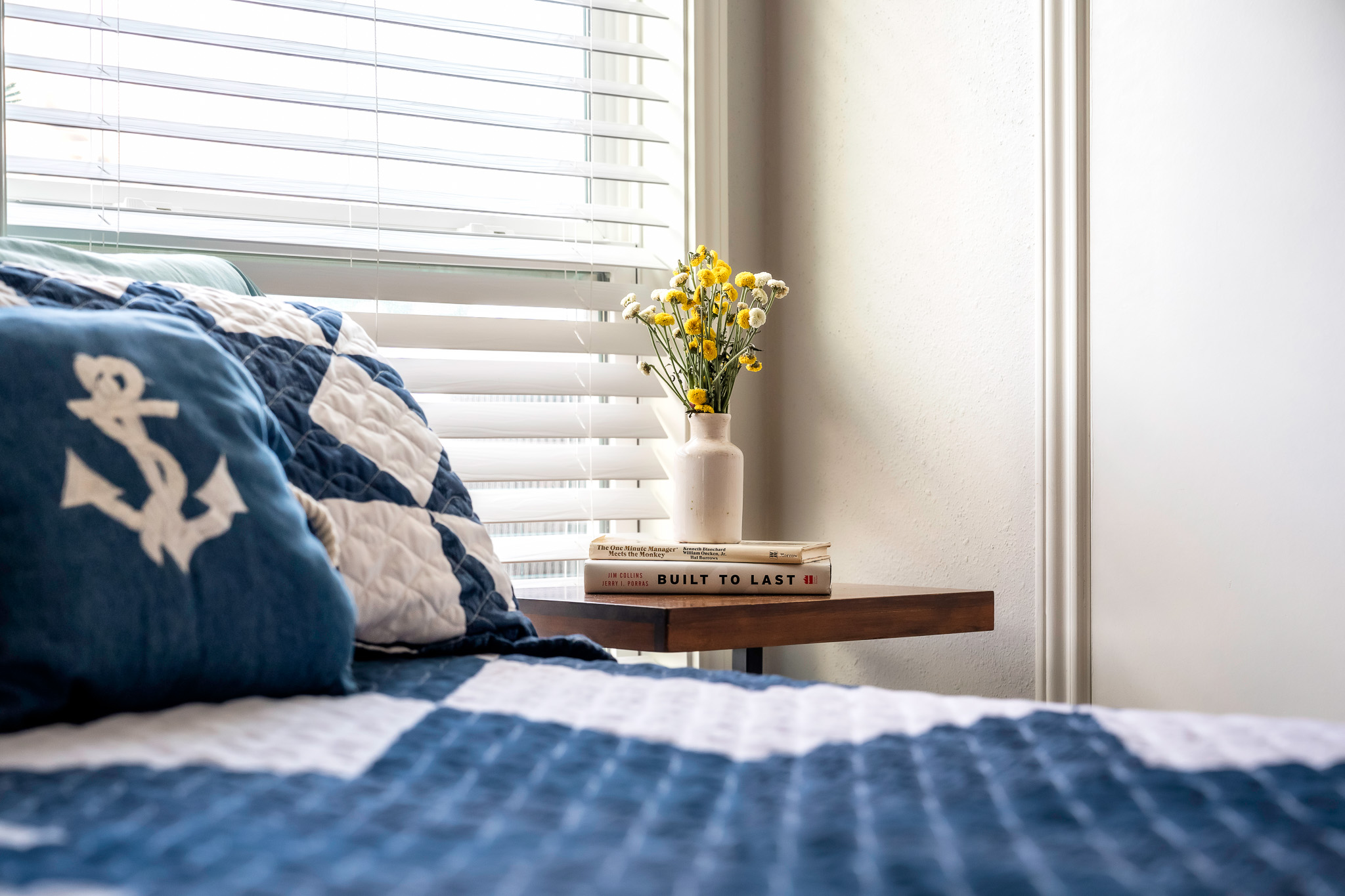 Meticulously decorated with nautical charm, soft textures, and calming coastal accents.