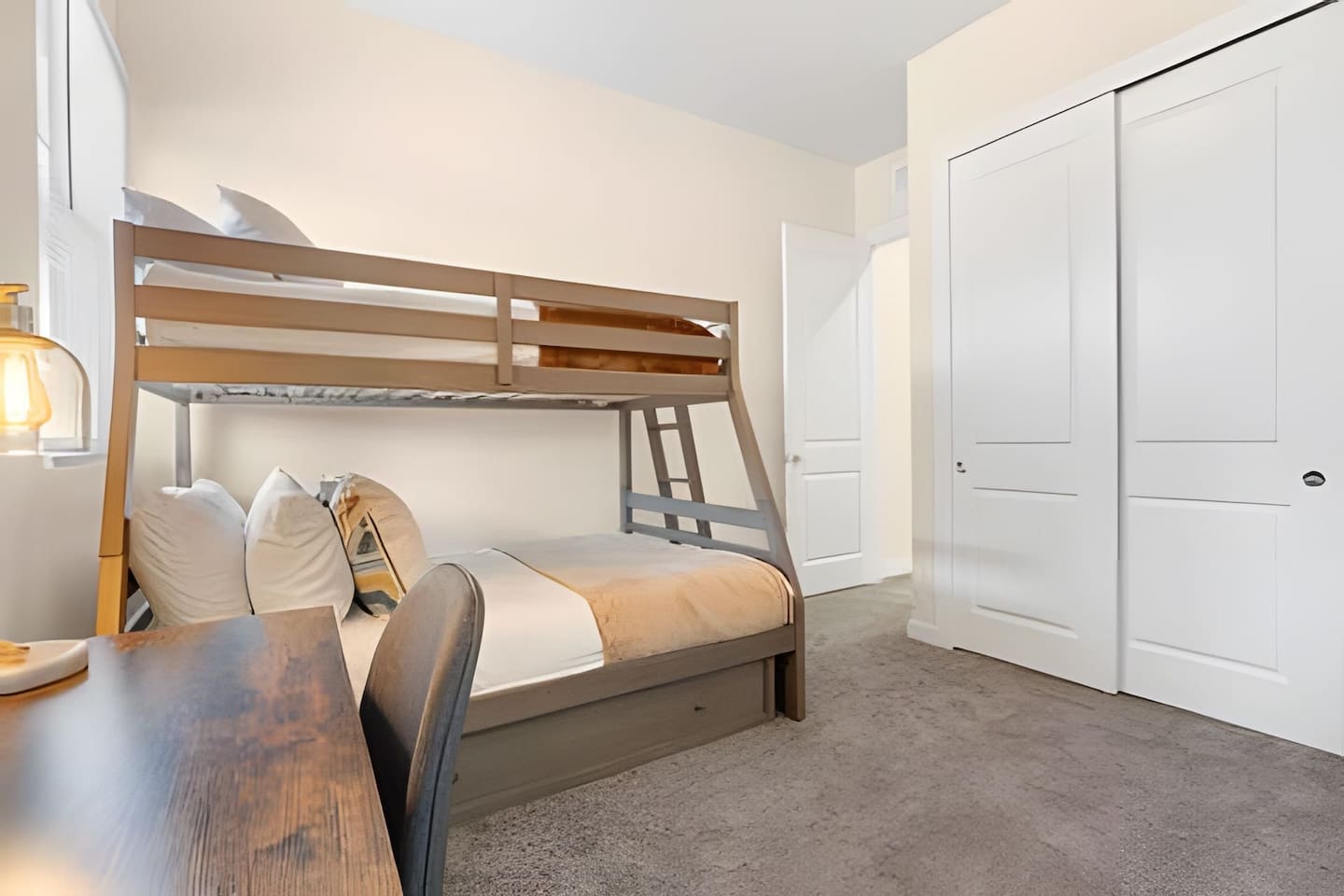 Enjoy this room with bunk beds and plenty of natural light.