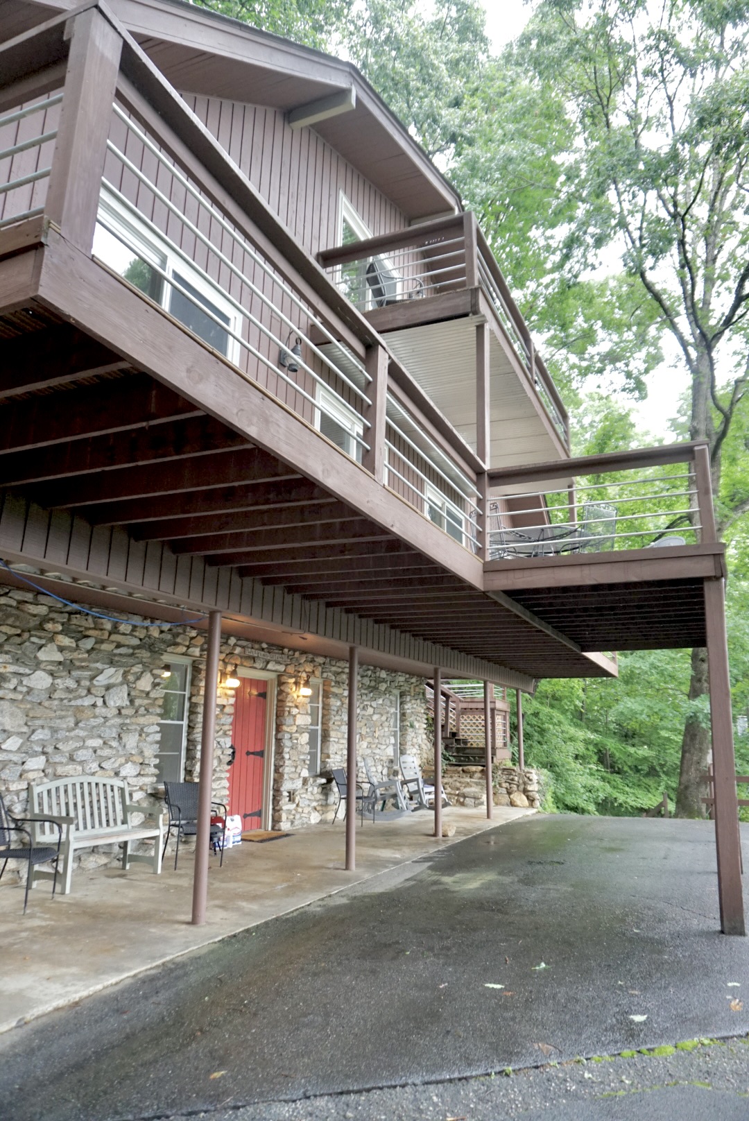 Exterior Retreat: Wrap around porches and stone accents welcome you to nature's embrace!