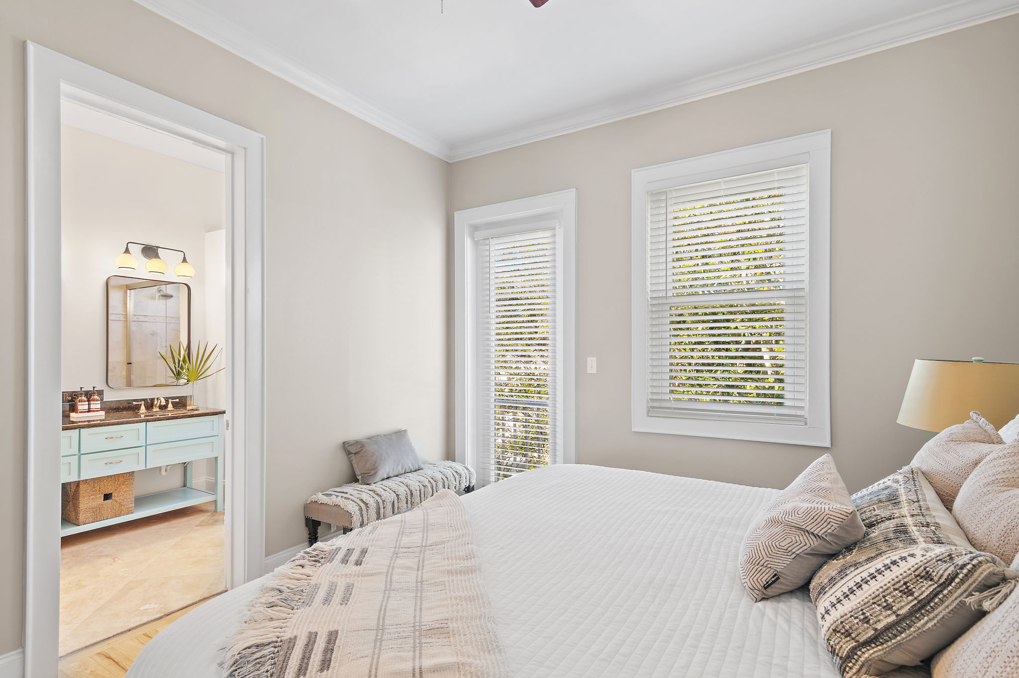 Primary bedroom with attached large bathroom is on the 3rd floor, across the landing from the bunk room.