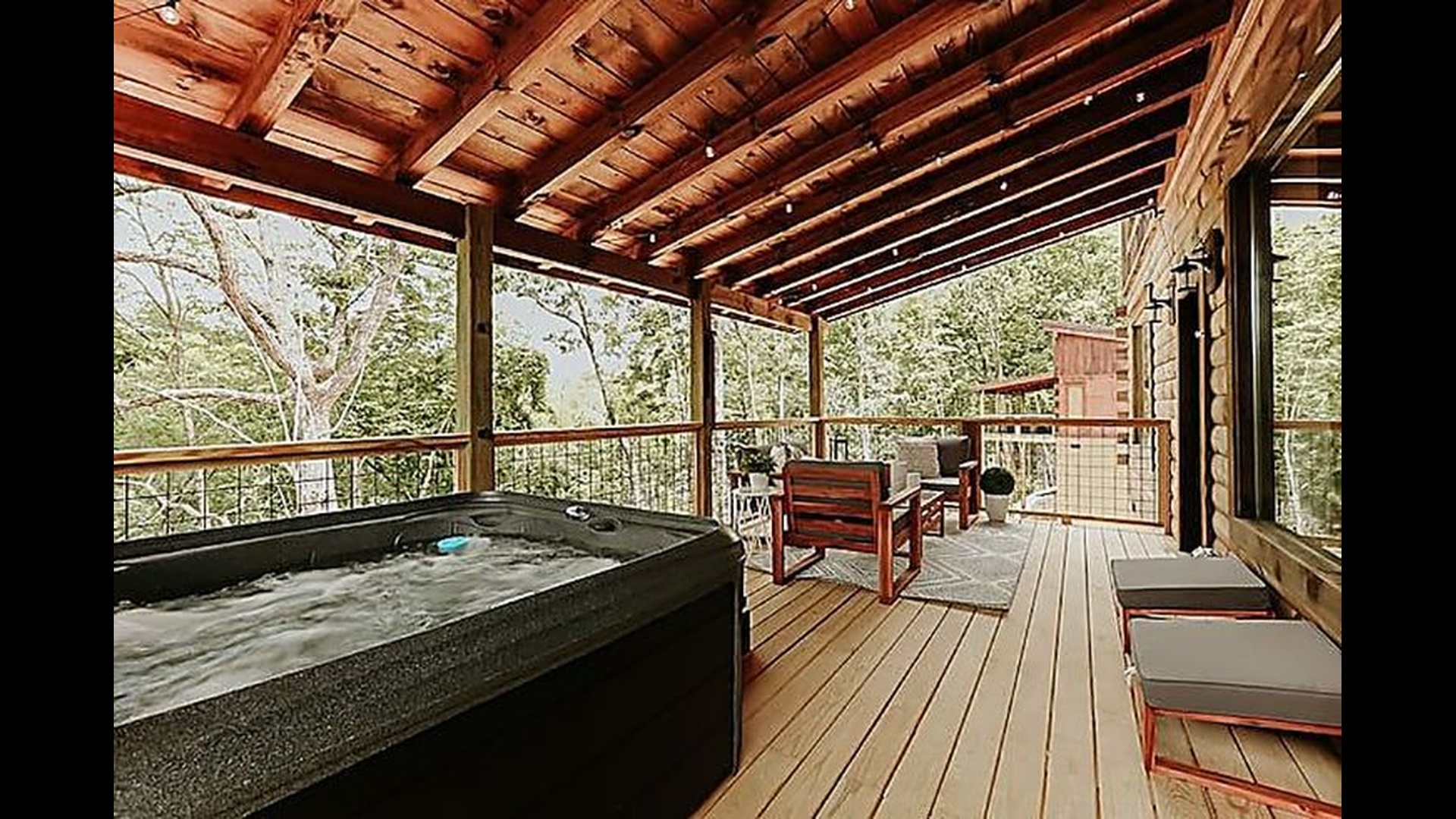 Enjoy a warm soak in the private hot tub while you listen to the breeze move through the trees