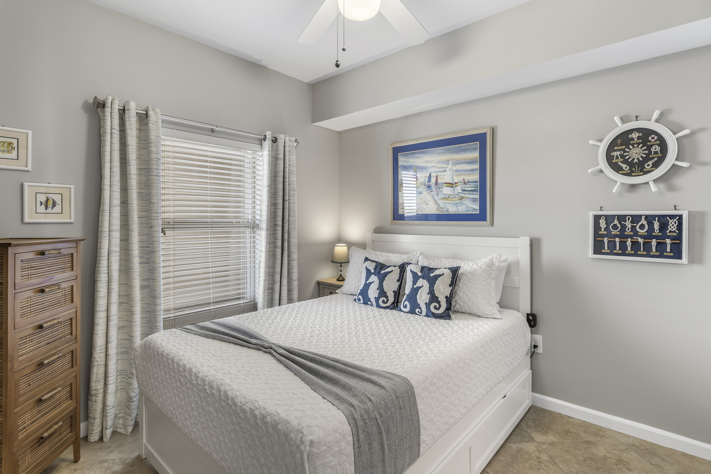 Guest Bedroom has Queen + Twin Trundle Bed, Smart TV, attached closet, and attached bathroom with shower/tub combo