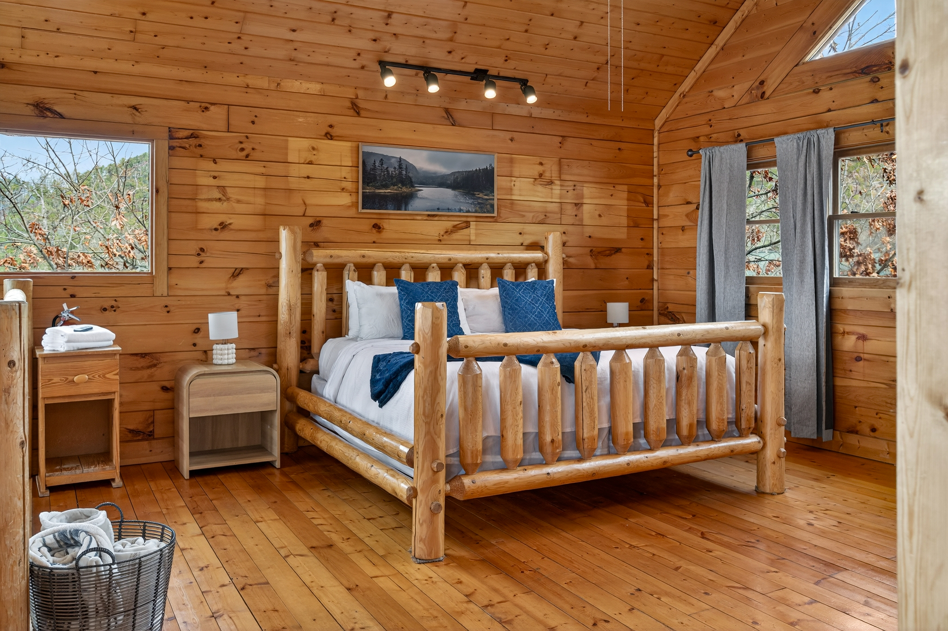 King bed in the upper-level loft bedroom