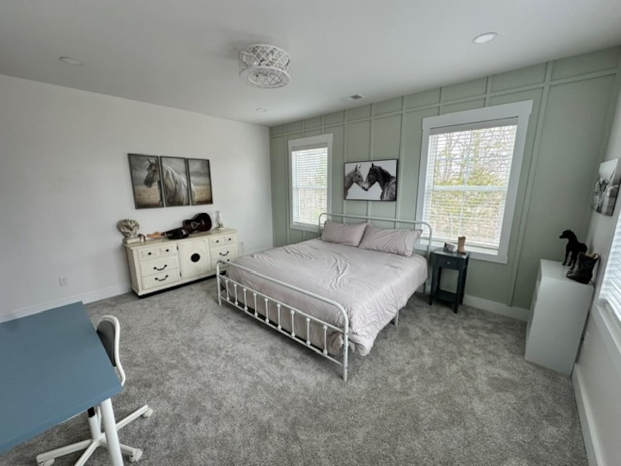 Welcome to Kentucky! This western-themed room is definitely a taste of the bluegrass. Private sink and makeup vanity with shared access to private toilet and shower with bedroom #4. Desk and chair available.