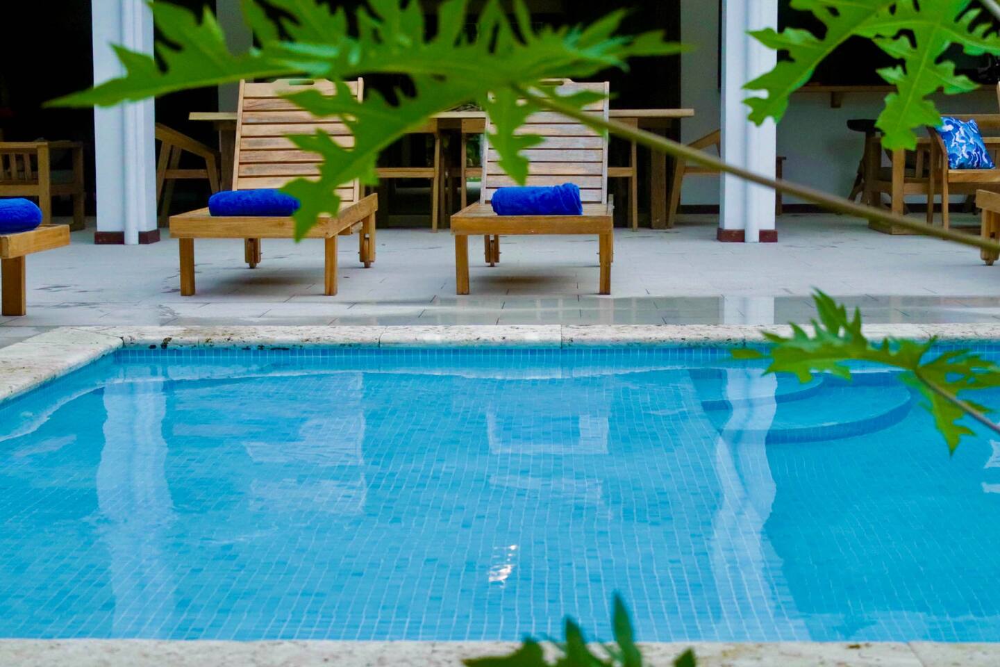 Lounge by the pool or take a dip to cool off. Pool is multi-level .