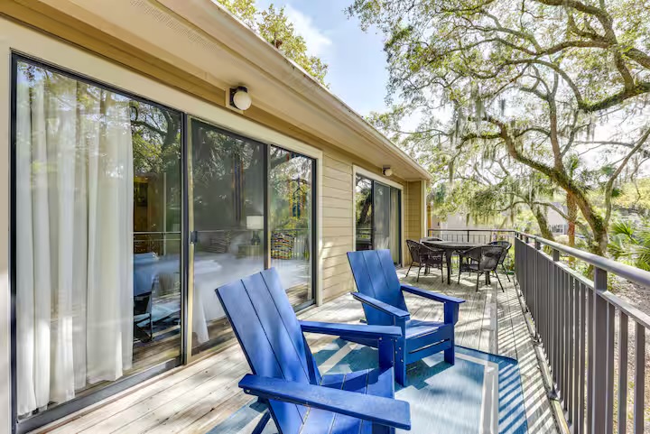 Oversized deck overlooking lush landscape and golf course