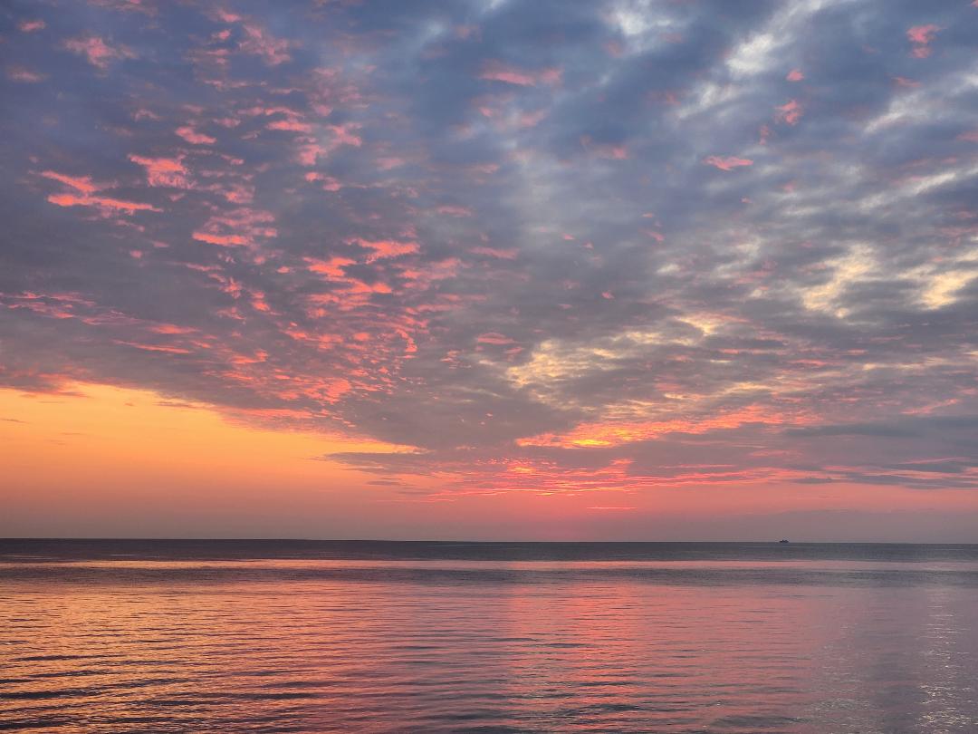 Enjoy the view from then waterfront deck. Dramatic sunset skies over Lake Erie are common.