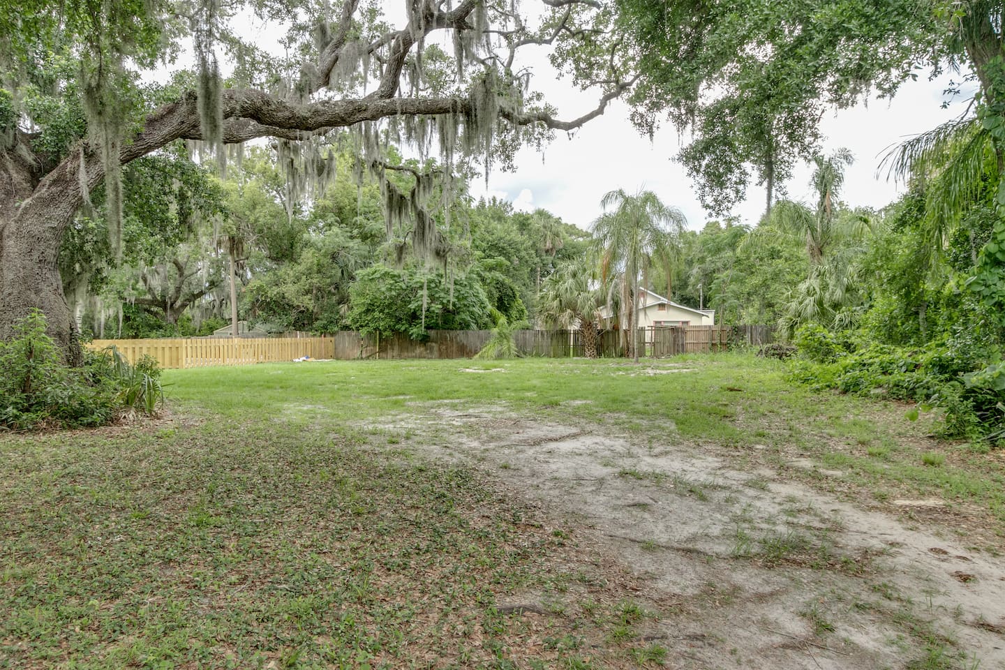 Circular Driveway with LARGE Acre Lot and Historic Trees